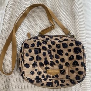 Twelvelittle diaper bag clutch in leopard print with changing mat